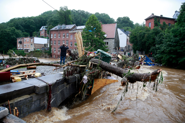 epa09346086 General debris in the flood waters after heavy rains in Ensival, Verviers, Belgium, 15 July 2021. Heavy rains have caused widespread damage and flooding in parts of Belgium.  EPA-EFE/STEPHANIE LECOCQ